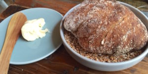 Home churned butter and sourdough bread. A perfect crust and crumb.