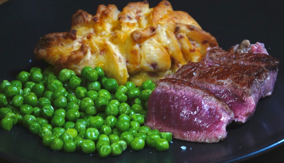 Jan 5: NY Strip Steak with Double Stuffed Potato and Green Peas